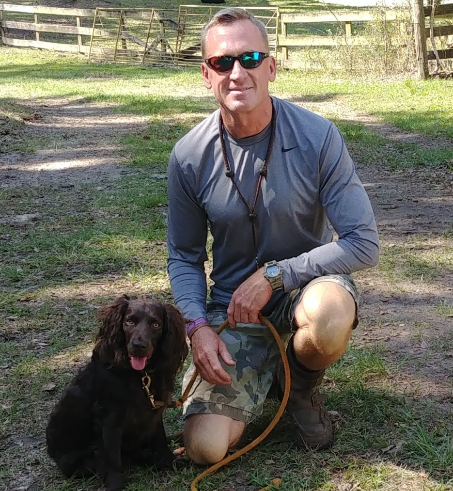 Dog trainer and a dog